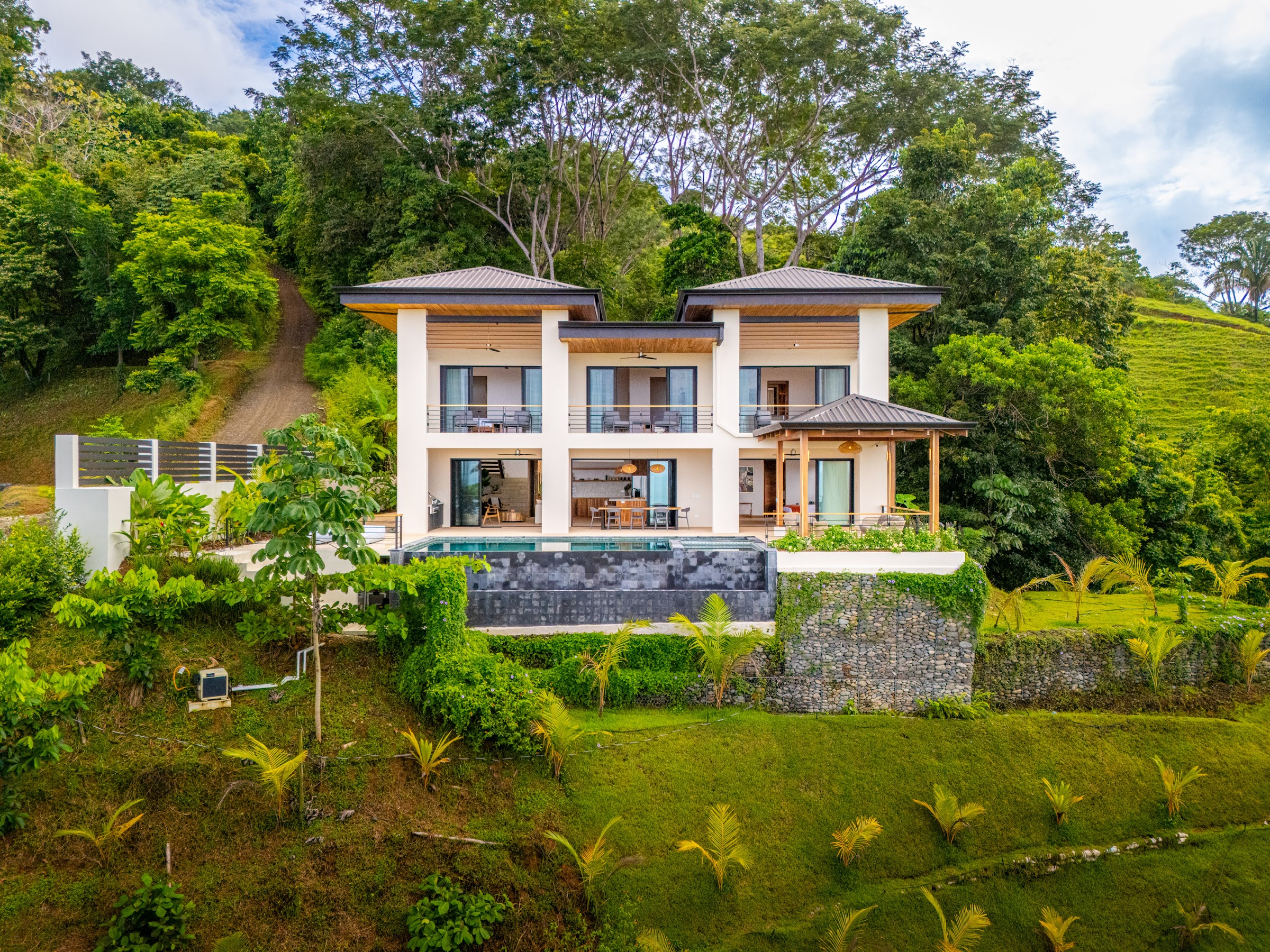 Front exterior of Villa Del Cielo, the first completed home at Farmstead Collection in Costa Rica