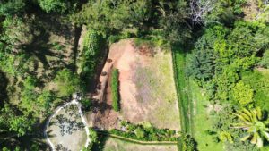 Lot 01 from above showing the access road and forest boundary, Farmstead Collection