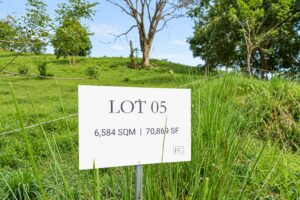 Lot 05 marker sign at Farmstead Collection, a 6,584 m2 estate homesite