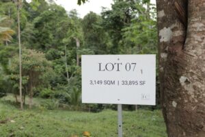 Lot 07 marker sign at Farmstead Collection, a 3,149 m2 secluded homesite